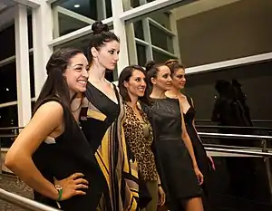 Image 69Women wearing contemporary outfits at a 2015 fashion show (from 2010s in fashion)