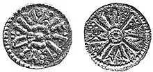 a coin of Alberht I..mw-parser-output cite.citation{font-style:inherit;word-wrap:break-word}.mw-parser-output .citation q{quotes:"\"""\"""'""'"}.mw-parser-output .citation:target{background-color:rgba(0,127,255,0.133)}.mw-parser-output .id-lock-free a,.mw-parser-output .citation .cs1-lock-free a{background:url("//upload.wikimedia.org/wikipedia/commons/6/65/Lock-green.svg")right 0.1em center/9px no-repeat}.mw-parser-output .id-lock-limited a,.mw-parser-output .id-lock-registration a,.mw-parser-output .citation .cs1-lock-limited a,.mw-parser-output .citation .cs1-lock-registration a{background:url("//upload.wikimedia.org/wikipedia/commons/d/d6/Lock-gray-alt-2.svg")right 0.1em center/9px no-repeat}.mw-parser-output .id-lock-subscription a,.mw-parser-output .citation .cs1-lock-subscription a{background:url("//upload.wikimedia.org/wikipedia/commons/a/aa/Lock-red-alt-2.svg")right 0.1em center/9px no-repeat}.mw-parser-output .cs1-ws-icon a{background:url("//upload.wikimedia.org/wikipedia/commons/4/4c/Wikisource-logo.svg")right 0.1em center/12px no-repeat}.mw-parser-output .cs1-code{color:inherit;background:inherit;border:none;padding:inherit}.mw-parser-output .cs1-hidden-error{display:none;color:#d33}.mw-parser-output .cs1-visible-error{color:#d33}.mw-parser-output .cs1-maint{display:none;color:#3a3;margin-left:0.3em}.mw-parser-output .cs1-format{font-size:95%}.mw-parser-output .cs1-kern-left{padding-left:0.2em}.mw-parser-output .cs1-kern-right{padding-right:0.2em}.mw-parser-output .citation .mw-selflink{font-weight:inherit}"Full Record of 1995.6002: coin of Alberht". The Fitzwilliam Museum, Cambridge. Archived from the original on 22 February 2019. Retrieved 22 February 2019. Both sides of the coin have text in runes laid out between the limbs of a saltire pommée, decorated with pellets. Obverse: eþ æl be rt; reverse: ti æl re d.Archibald, Cowell & Fenwick 1996, p. 8.
