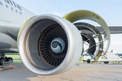 Turbofan (CF-6) inlet and fan. The core flow area, 1/6th, is visible through the fan. A comparison of how effective the subsonic inlet is at compressing air compared with the fan is given by inlet ram and fan temperature rises for a CFM56 of about 30 and 40 °F at 0.85 Mn cruise. Temperature rise is connected to pressure rise by the losses incurred in the way the compression is achieved and all three are visually apparent on a T~s diagram.