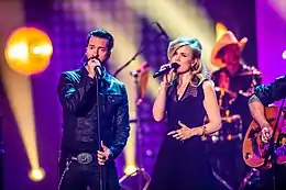 Ilse DeLange in 2016 (with German band The BossHoss)