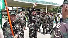 MAJ Virgilio S Ferrer II (RES) JAGS gives instructions to his personnel during the conduct of the 35th NRW Celebrations at Camp Aguinaldo.
