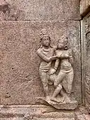 Amorous couple, kama scene on outer wall
