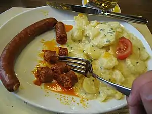 Swiss cuisine&nbsp;–  paprika sausage with potatoes at the Zeughauskeller, Zürich, Switzerland
