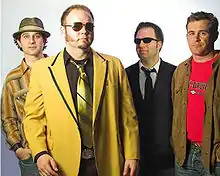 Candygram For Mongo featuring, from left to right: drummer Gary Sharp, lead singer Tony Shea, lead guitar Dan Cohen & bass James Baker