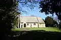 Church of the Holy Ascension, Melton Ross, Lincolnshire, 1867 by Ewan Christian, of stone with a bellcote and broad chancel apse