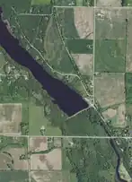 The lower part of the Forestville Millpond and the start of the lower portion of the Ahnapee River; taken June 27, 2020