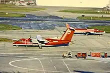 Recently painted in the new Air Link colours. This was to be my ride to Toledo - I didn't realize how short the distance was. Company metro slides behind the Dash also in new colours.