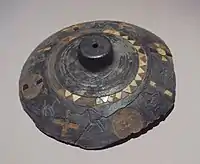 Decorated lid of a large pyxis, similar to those found in Ai-Khanoum, Takht-i Sangin, 3rd-2nd century BC, National Museum of Antiquities of Tajikistan (M 7126)