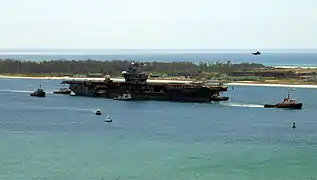 Oriskany leaves port for the last time, bound for the Gulf of Mexico to become an artificial reef.