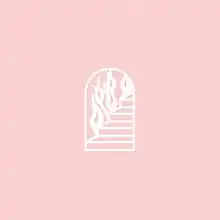 A doorway leading to a stairwell, with a raging fire beside it, on a dark pink background.