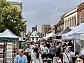 Shoppers on a cloudy day at St Albans Market.