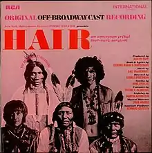 James Rado and Gerome Ragni in "hippie" costumes and long hair, together with three men in traditional Native American dress