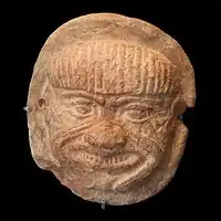 Terracotta plaquette with head of Humbaba, 2nd millennium BCE, Louvre Museum, Paris