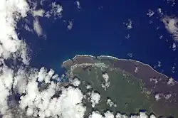 Satellite image showing Fagamalo and neibouring villages with reefs off the coast and lava fields to the east in Saleaula, Mauga and Samalae'ulu. (NASA photo)