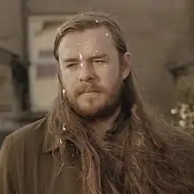 A sepia-toned photo of Flynn