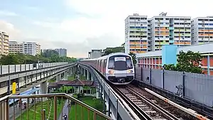 A Kawasaki Heavy Industries & CSR Qingdao Sifang C151A approaching Khatib MRT station in 2020.