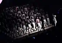 Dozens of shirtless men stood behind West while he performed at the 2015 Hollywood Bowl