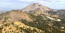 Conical peak from a ridge on a nearby mountain