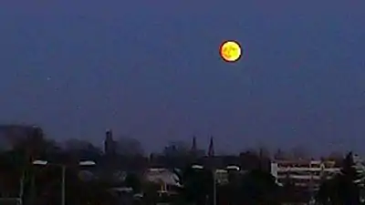 Near full moon over Berlin, Germany, in December 2015, approximately 30 minutes after moonrise