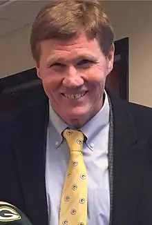 headshot photo of Mark Murphy wearing a suit and Packers tie