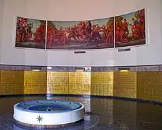 Lobby with murals and gilded post office boxes