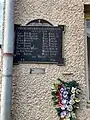 1928 plaque commemorating World War I victims
