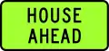 House Ahead (house-carrying truck convoy ahead)