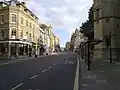 The northern section of St Aldate's Street from near the entrance to Tom Quad beneath Tom Tower.