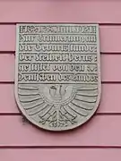 The tower's plaque in German