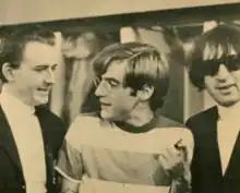 Foster (left) in 1965, with John Sebastian (center) and B. Mitchel Reed