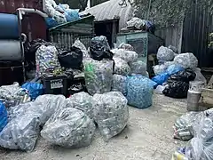 Bottles and cans are sorted by manufacturer.