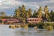 River bank of Don Khon with stilt wooden houses