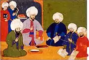 The consultation for the programme of the Şahname-ı Selim Han, with the scholars Şemseddin Ahmet Karabaği, Seyyid Lokman, the writer Ilyas Katib and the painters Nakkaş Osman and Ali, 1571–81 (folio&nbsp;9r)