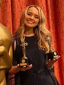 Dorrance presenting awards in 2022