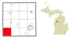 Location within Wexford County (red) and a portion of the Caberfae CDP (pink)