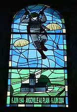 Stained glass window in church at Angoville-au-Plain, France.