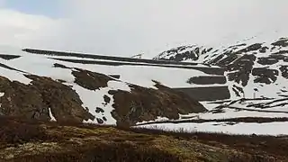 The snow-covered dam in June 2015