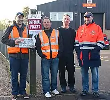 A group of striking postal workers man a Picket line at the Royal Mail's Bowthorpe depot in Norwich cin 2009.