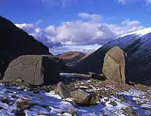 The church-like  Kirk Stone at right, and nearby a nearly cuboid stone