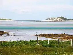 Towards Kirkibost Island Looking out across the sea towards the sand dunes at the southern end of Kirkibost Island