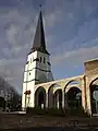 Church of Saint Ghislenus in Waarschot. Tower and ruins of the former church
