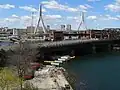 Construction of the Harborwalk, with the Charlestown Bridge and the Zakim Bridge