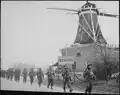 Canadian troops move through Holten, April 1945
