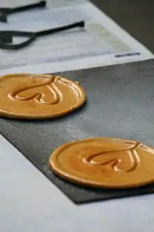 Two round sweets laying on a table